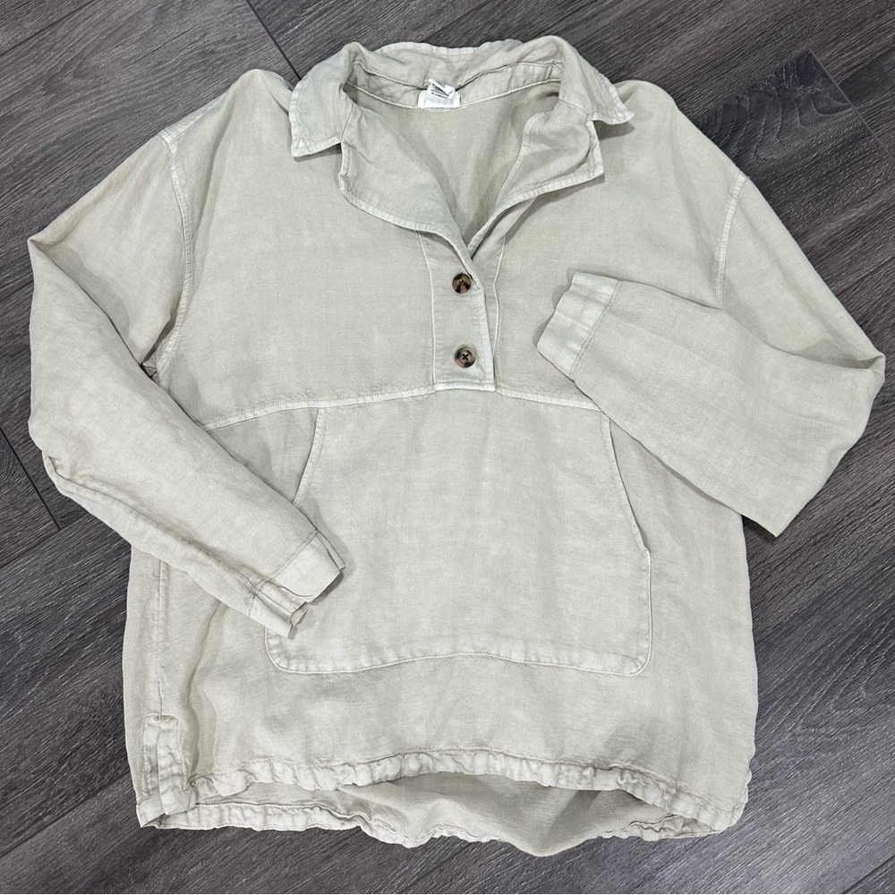 cream/very light green colored fall shirt